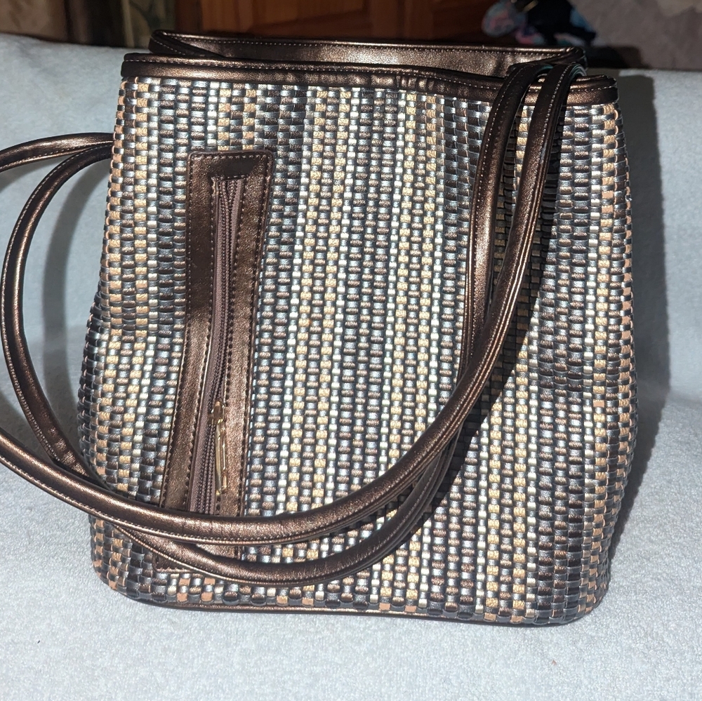 Samoe woven leather convertible satchel.